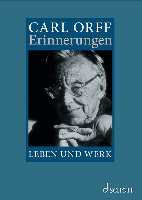 Dunkelblaues Buchcover mit Schwarz-Weiß-Fotografie von Carl Orff, der nachdenklich mit Brille in die Kamera blickt; Titel: „Carl Orff – Erinnerungen. Leben und Werk“.