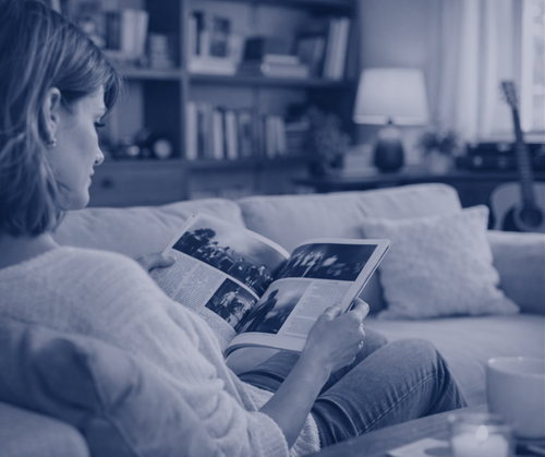 woman reading a music magazine